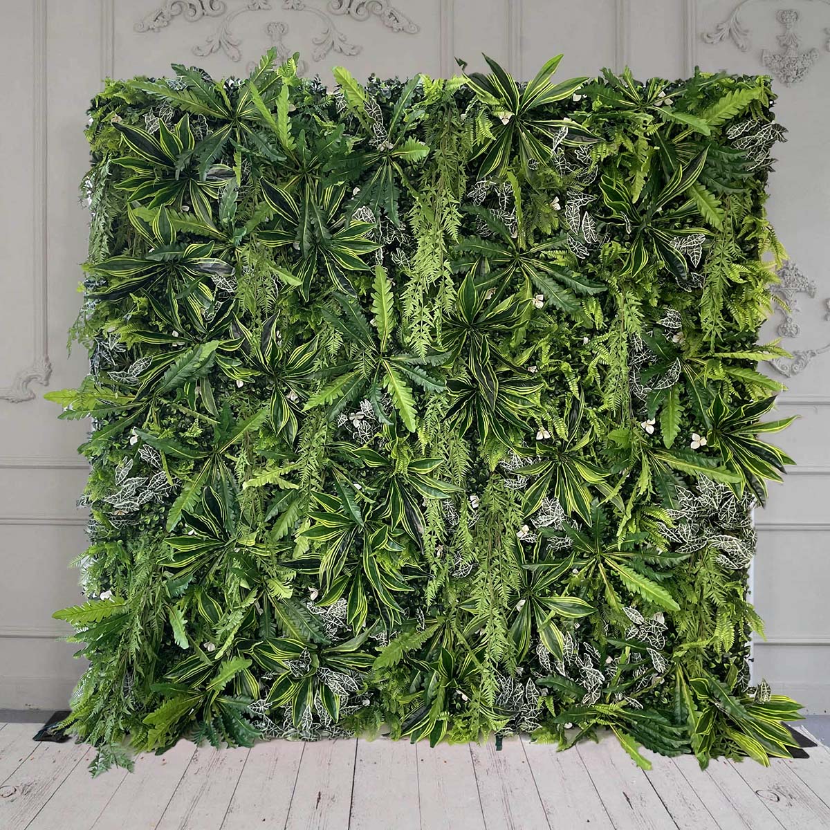 Crafted for realism, the green tropical leaves flower wall boasts a fabric backing and fade-resistant colors.