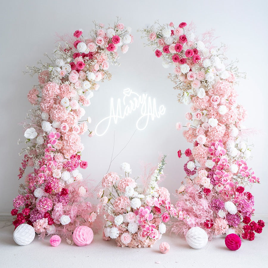 Crafted for realism, the pink flower arch boasts a fabric backing and fade-resistant colors.