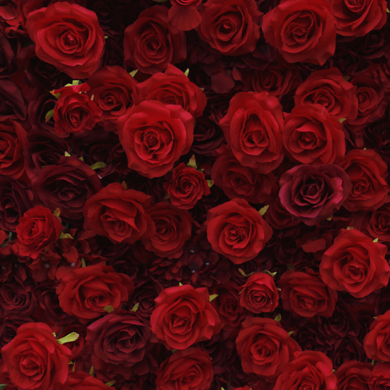 Red rose flower wall's detailed view highlights its vibrant, realistic shapes and fabric backing.