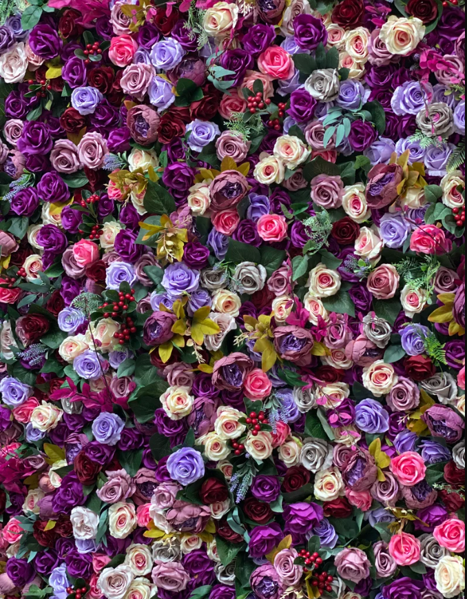 The purple rainbow fabric flower wall presents a colorful and splendid atmosphere.