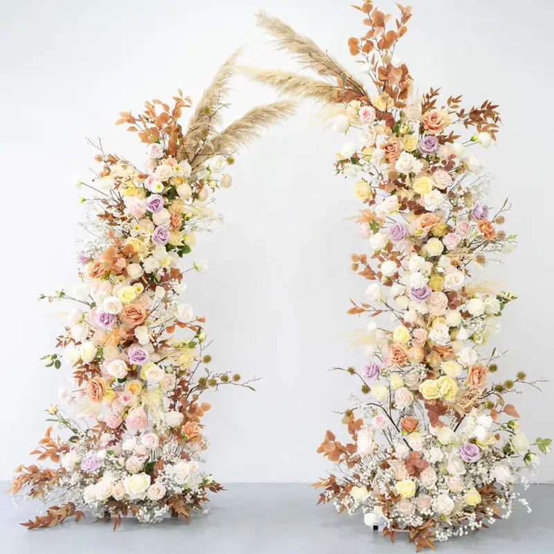 The cream white flower arch features a fabric backing, ensuring lifelike shapes and vibrant colors.