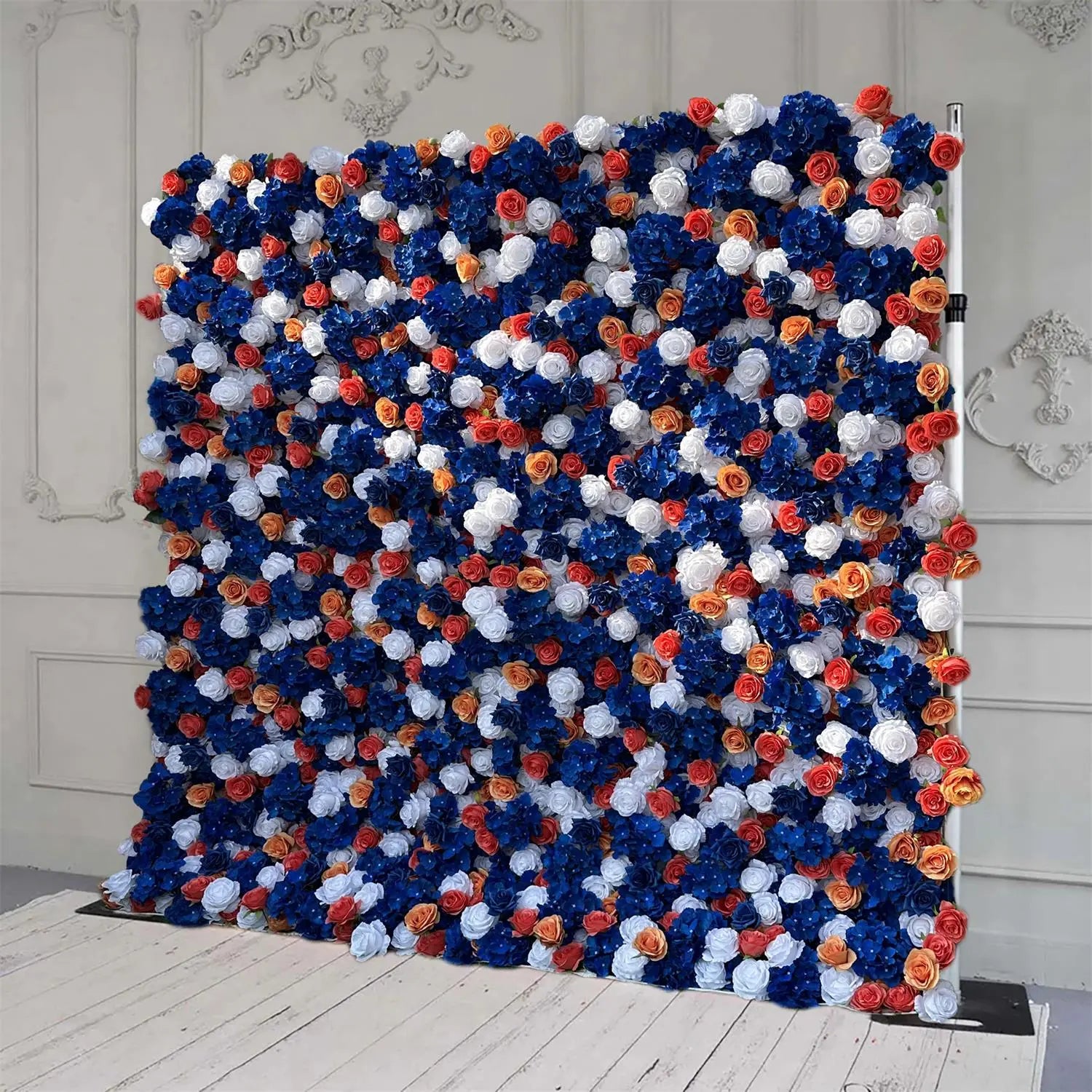 The blue white and orange roses flower wall's side view boasts realistic shapes and a fabric backing.