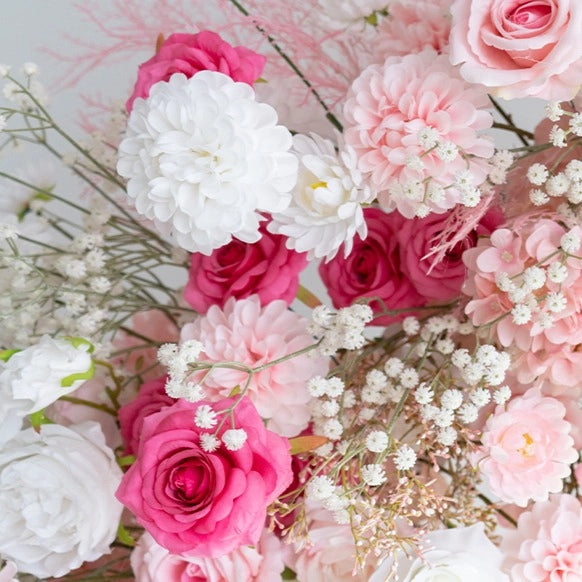 The rose red flower arch detailed view shows off vivid colors.