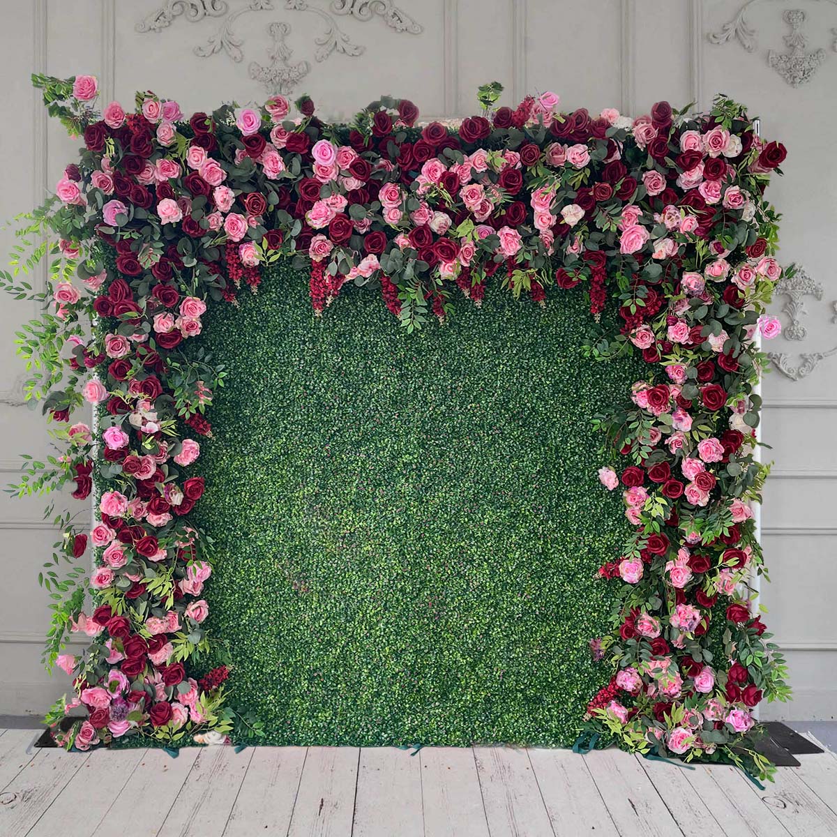 Crafted for realism, the green grass and red rose flower wall boasts a fabric backing and fade-resistant colors.