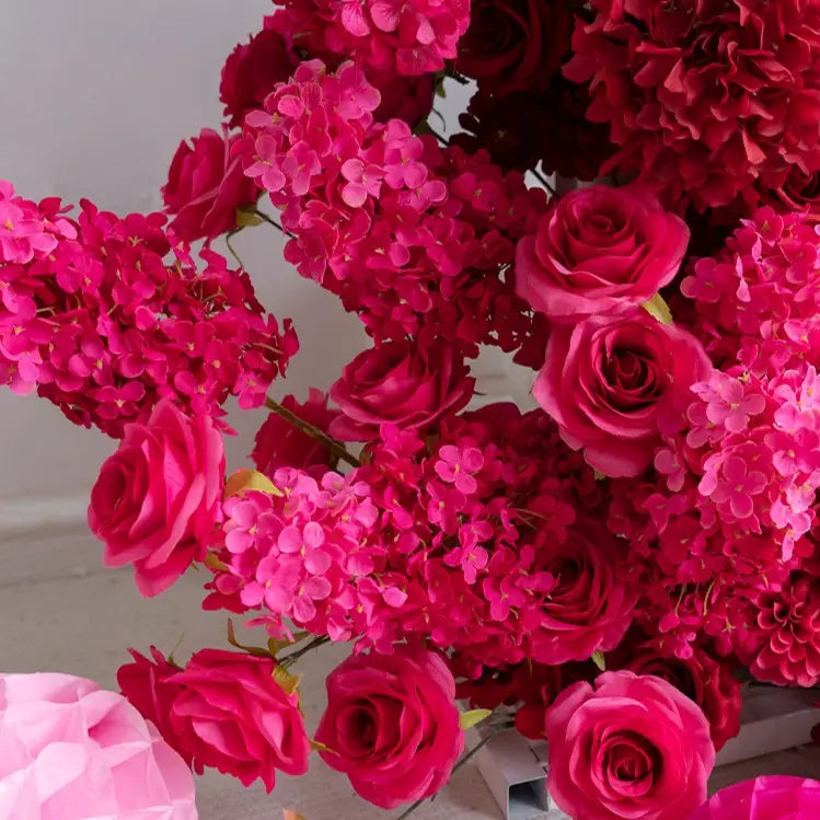 The rose red flower arch detailed view shows off vivid colors.