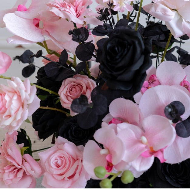 Vibrant colors give the pink black hanging flower set detailed realism and beauty.