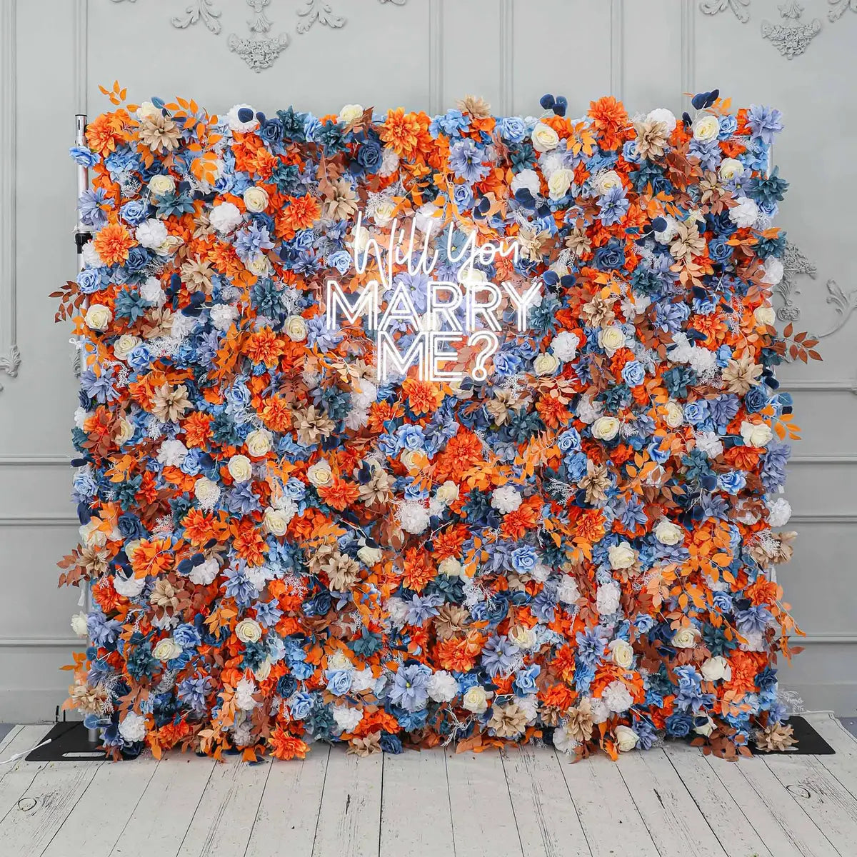 The orange blue flower wall features a fabric backing, ensuring lifelike shapes and vibrant colors. 