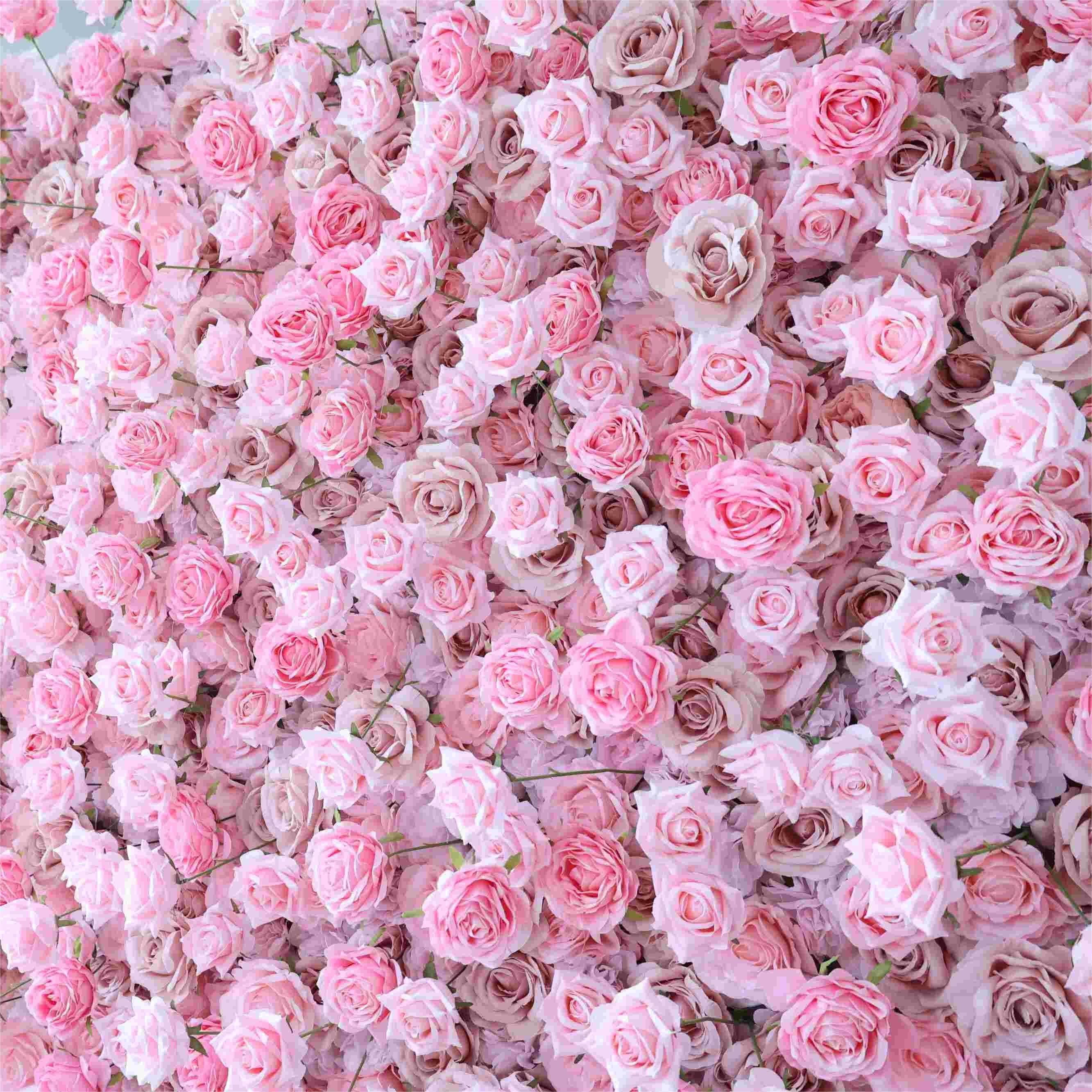 The pink flower wall's detailed view highlights its vibrant, realistic shapes and fabric backing.