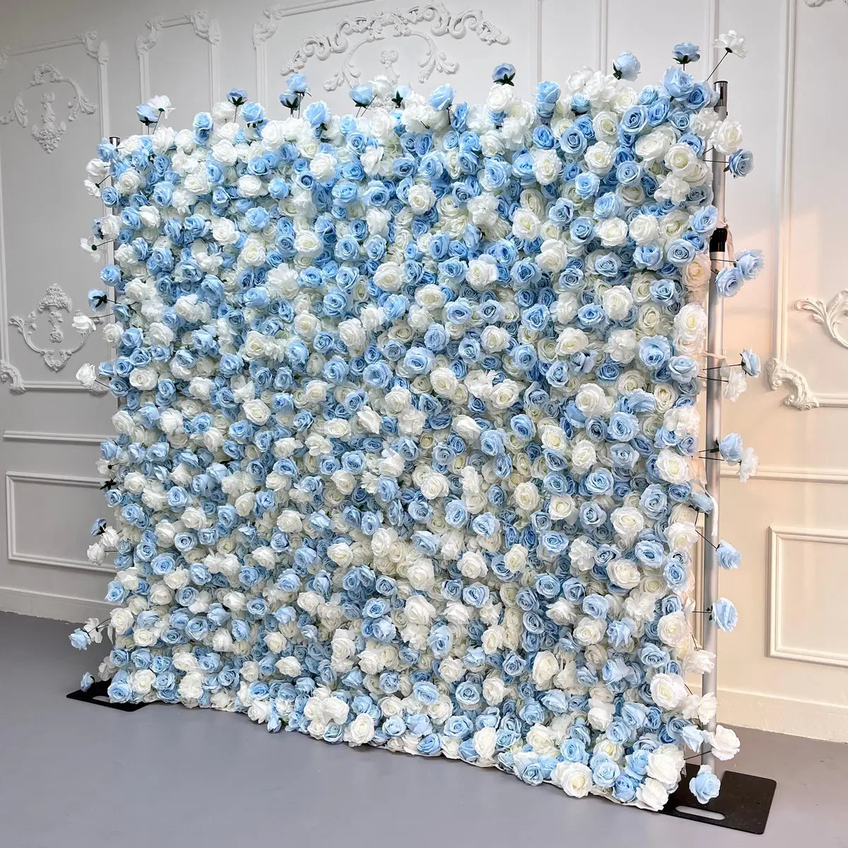 The blue flower arch's side view boasts realistic shapes and a fabric backing.