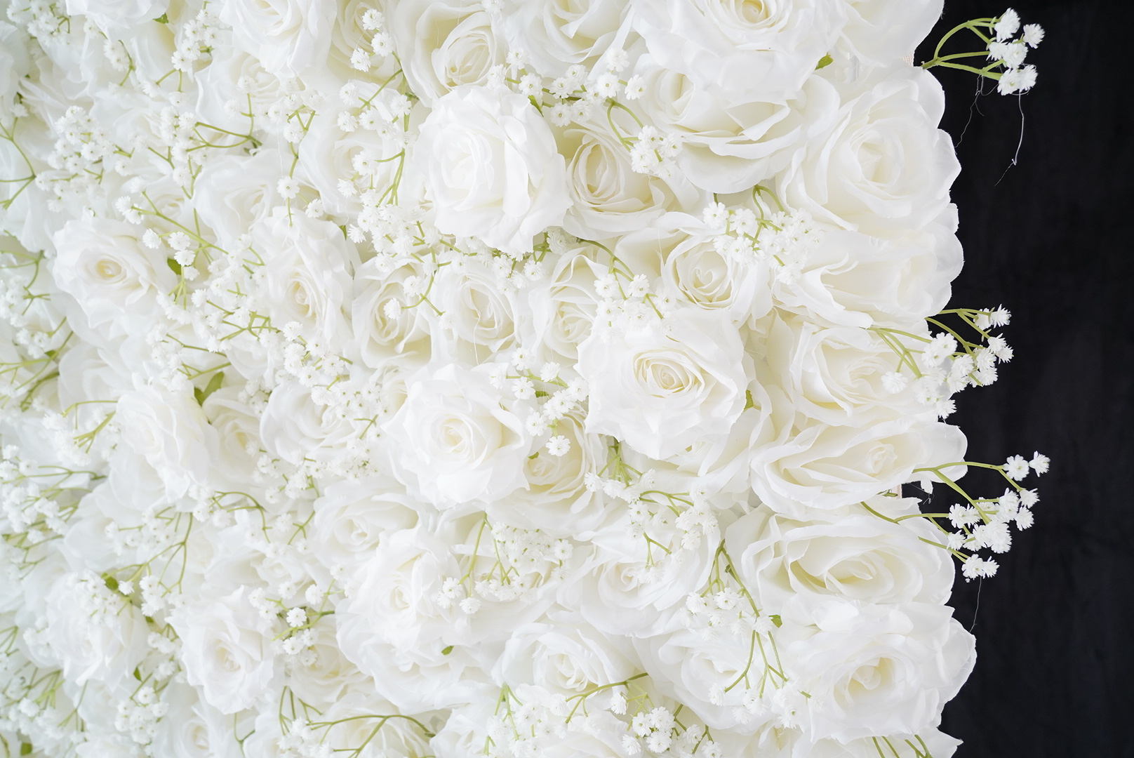 The baby breath pure white peony fabric flower wall looks vivid and lifelike.