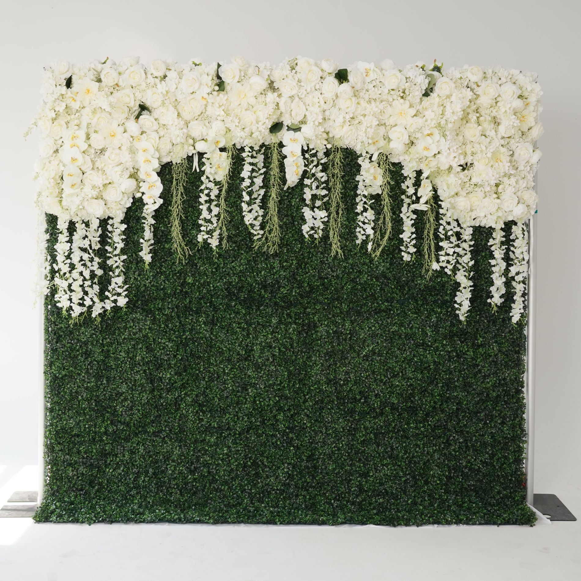 Cream white flower wall features a fabric backing, ensuring lifelike shapes and vibrant colors. 