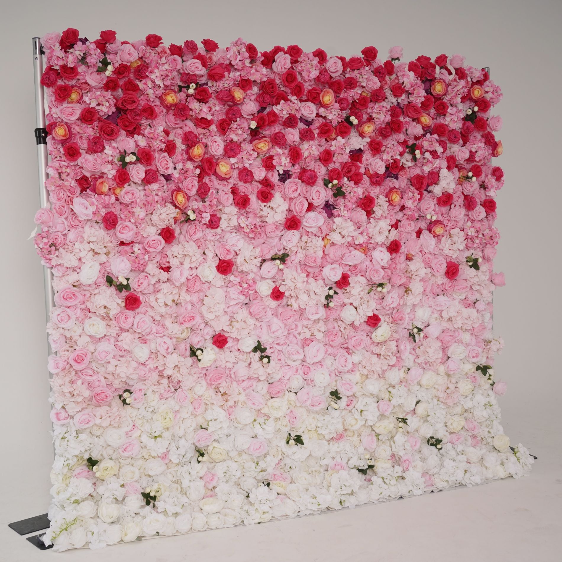 The gradient pink flower wall's side view boasts realistic shapes and a fabric backing