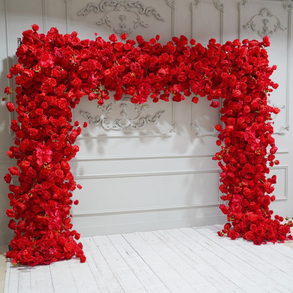 The red roses flower wall looks warm and romantic.