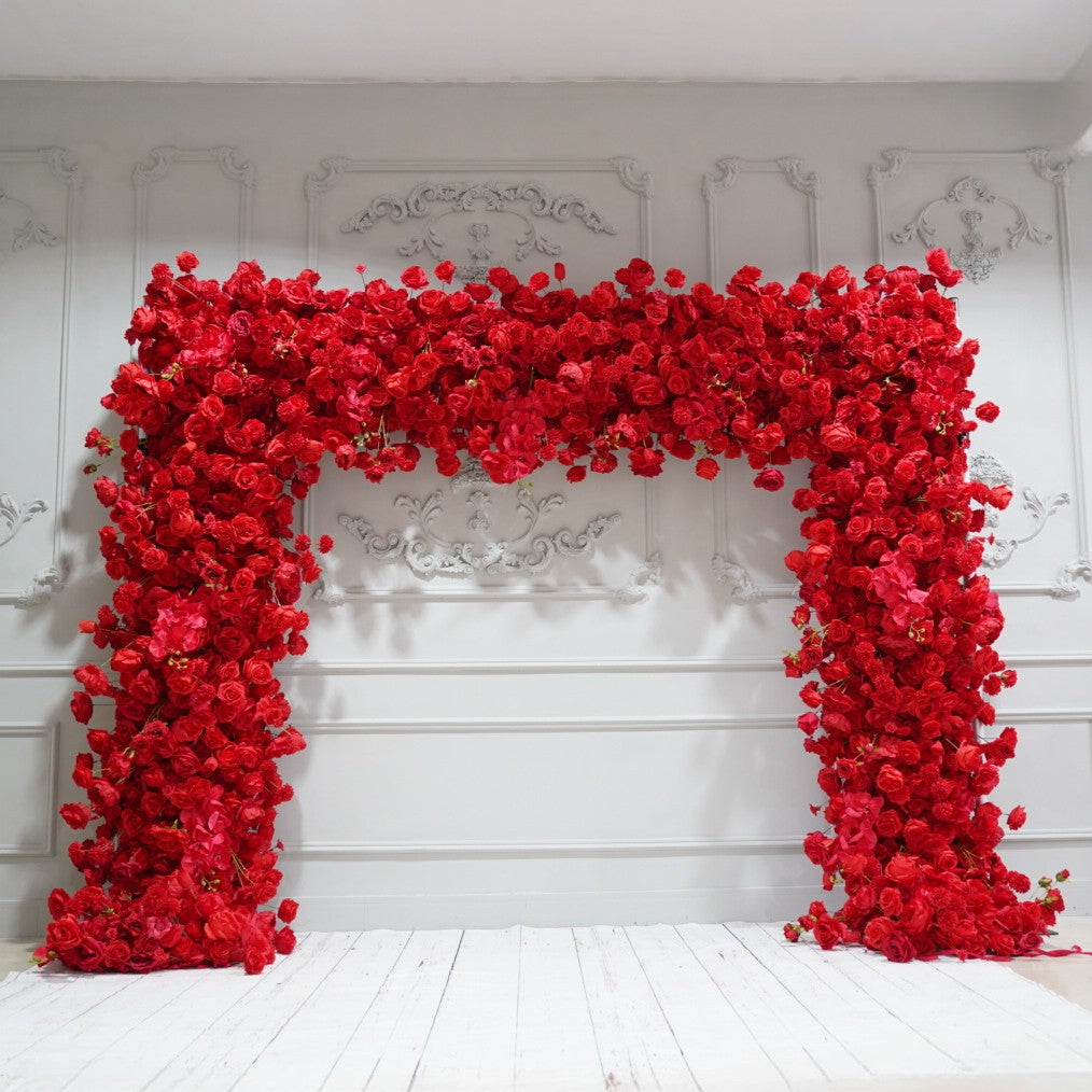 The red roses flower wall looks warm and romantic.