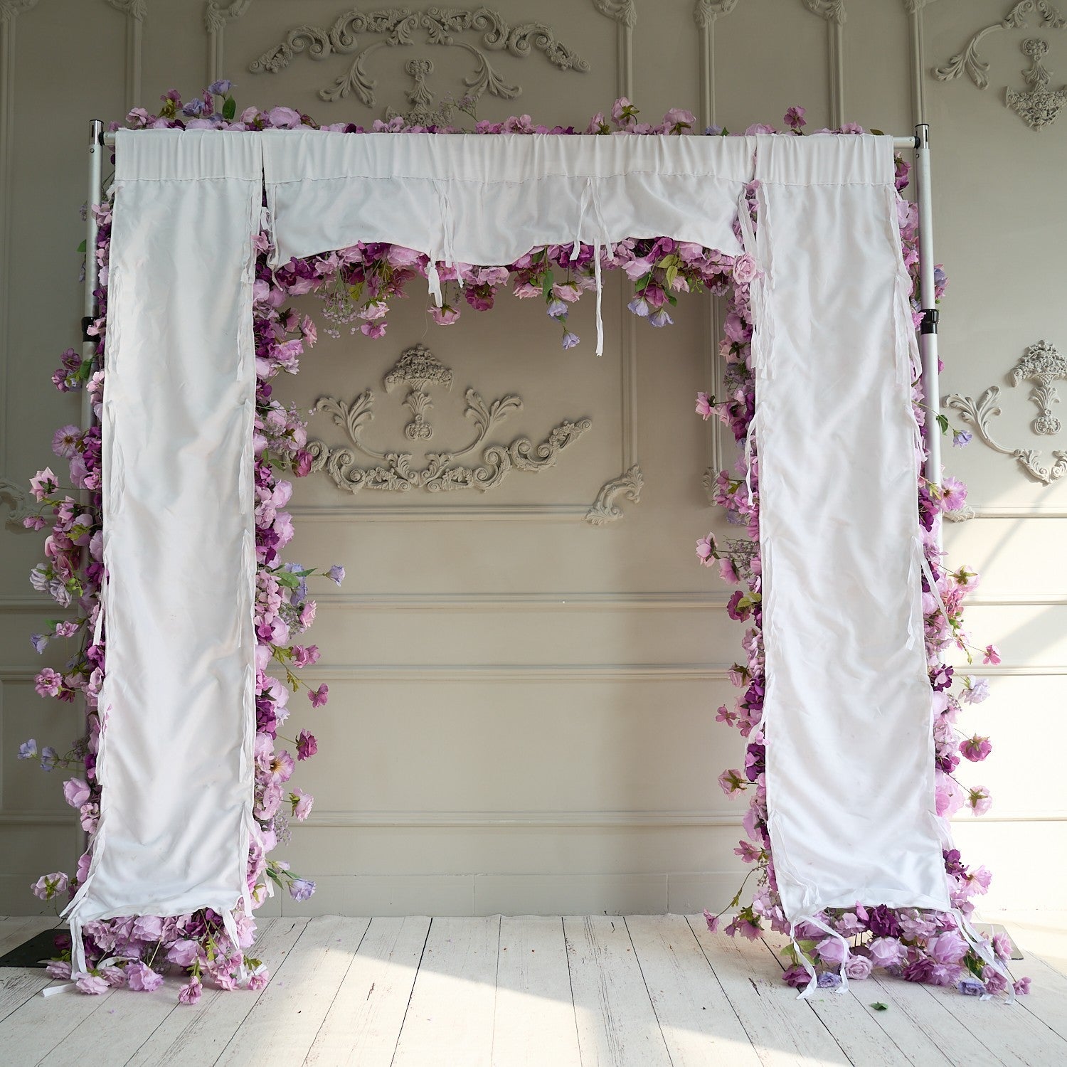 The purple roses florals flower wall is fixed to a cloth.