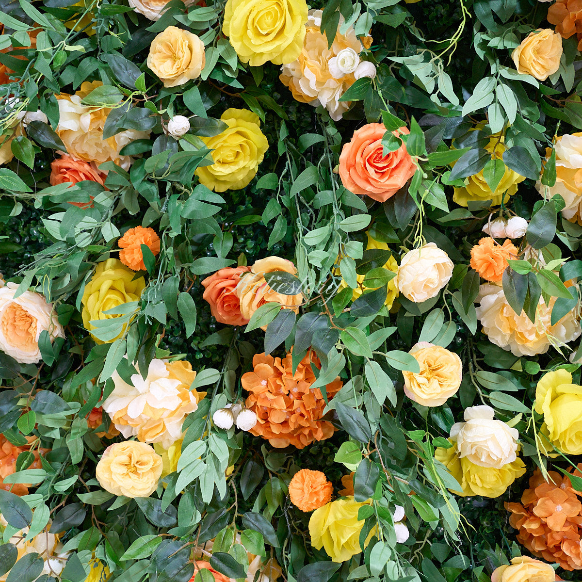 Balloon decor complements yellow green flower wall, offering a beautiful and festive backdrop.