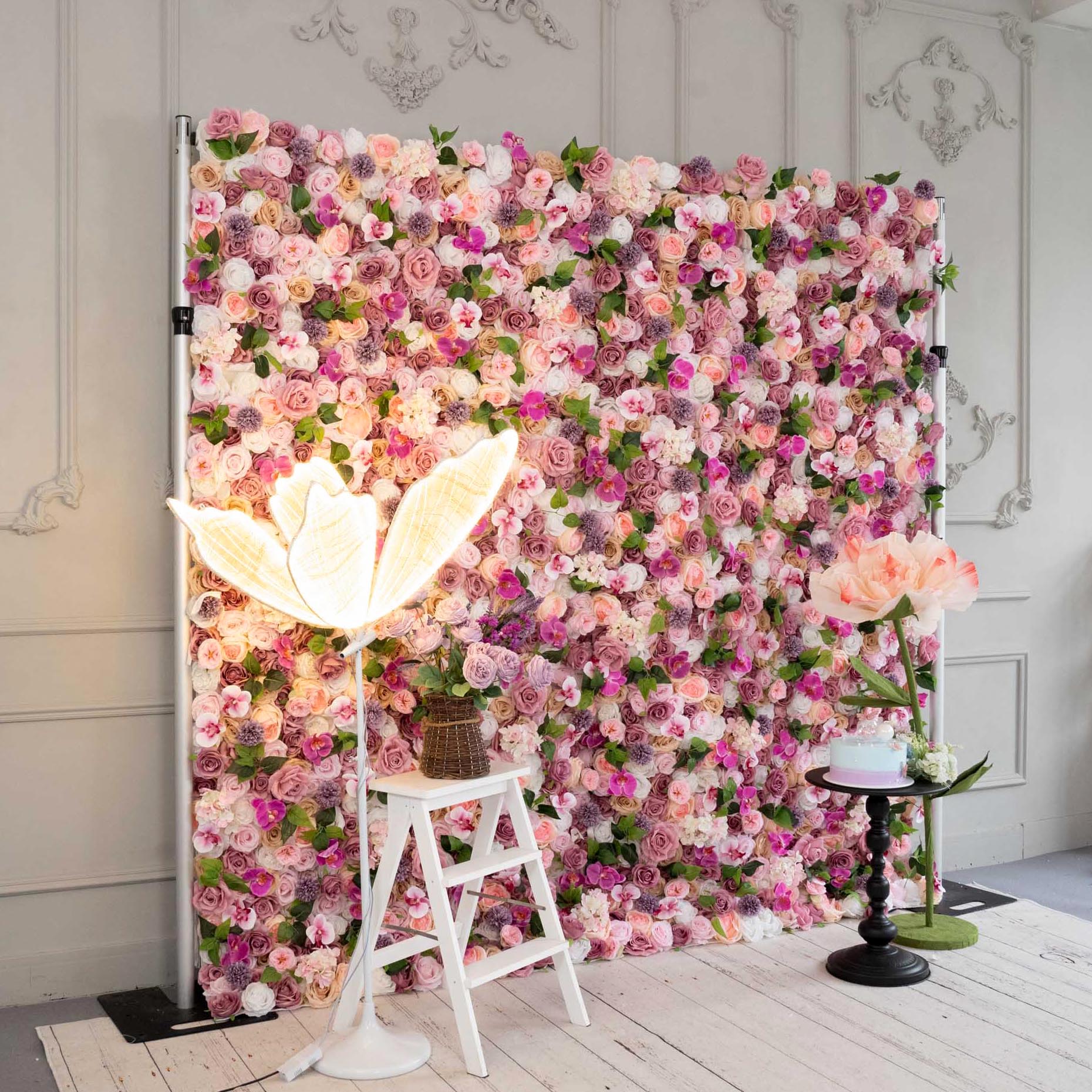 Colorful flower wall's side view boasts realistic shapes and a fabric backing