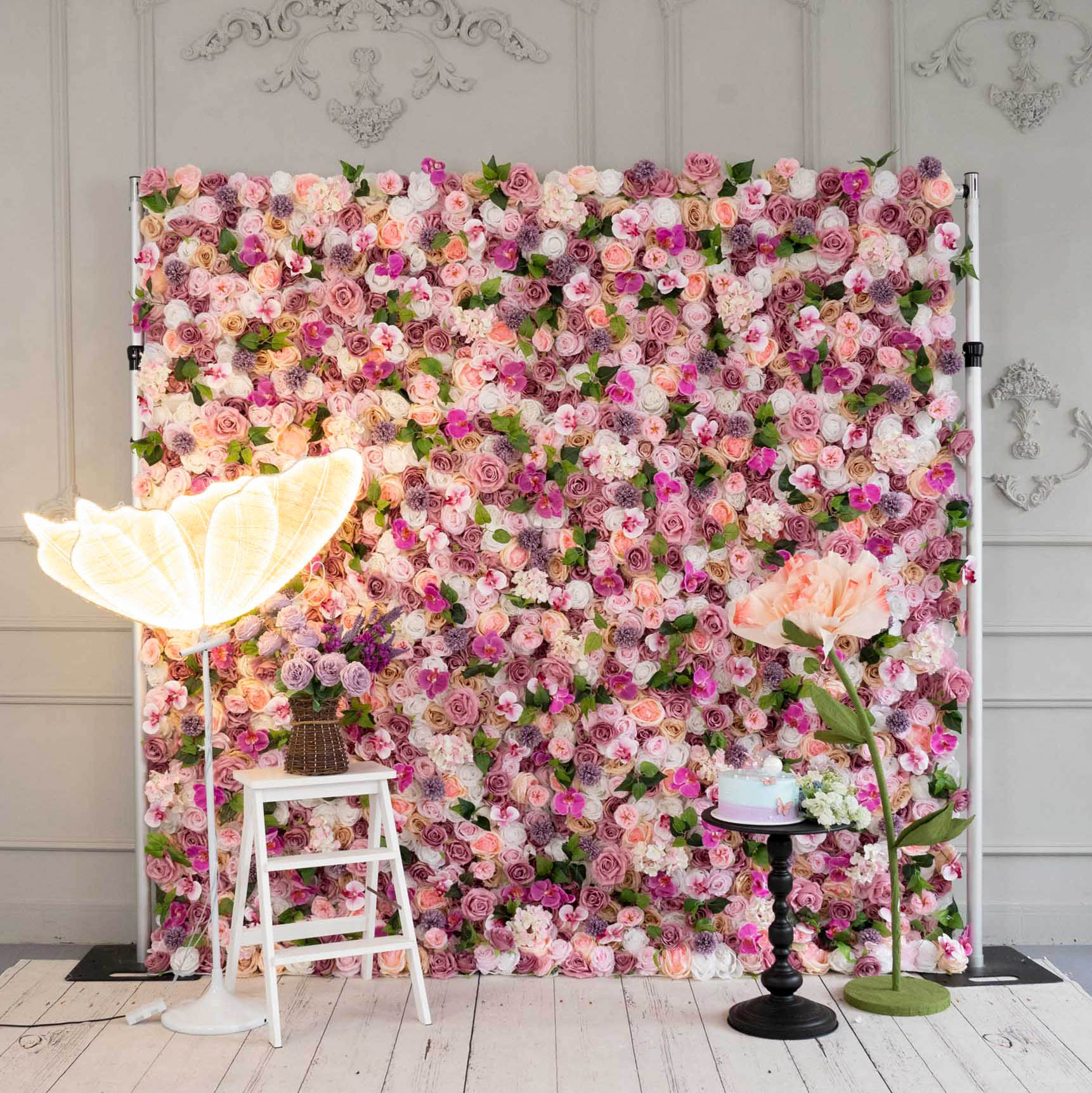 Colorful flower wall features a fabric backing, ensuring lifelike shapes and vibrant colors. 