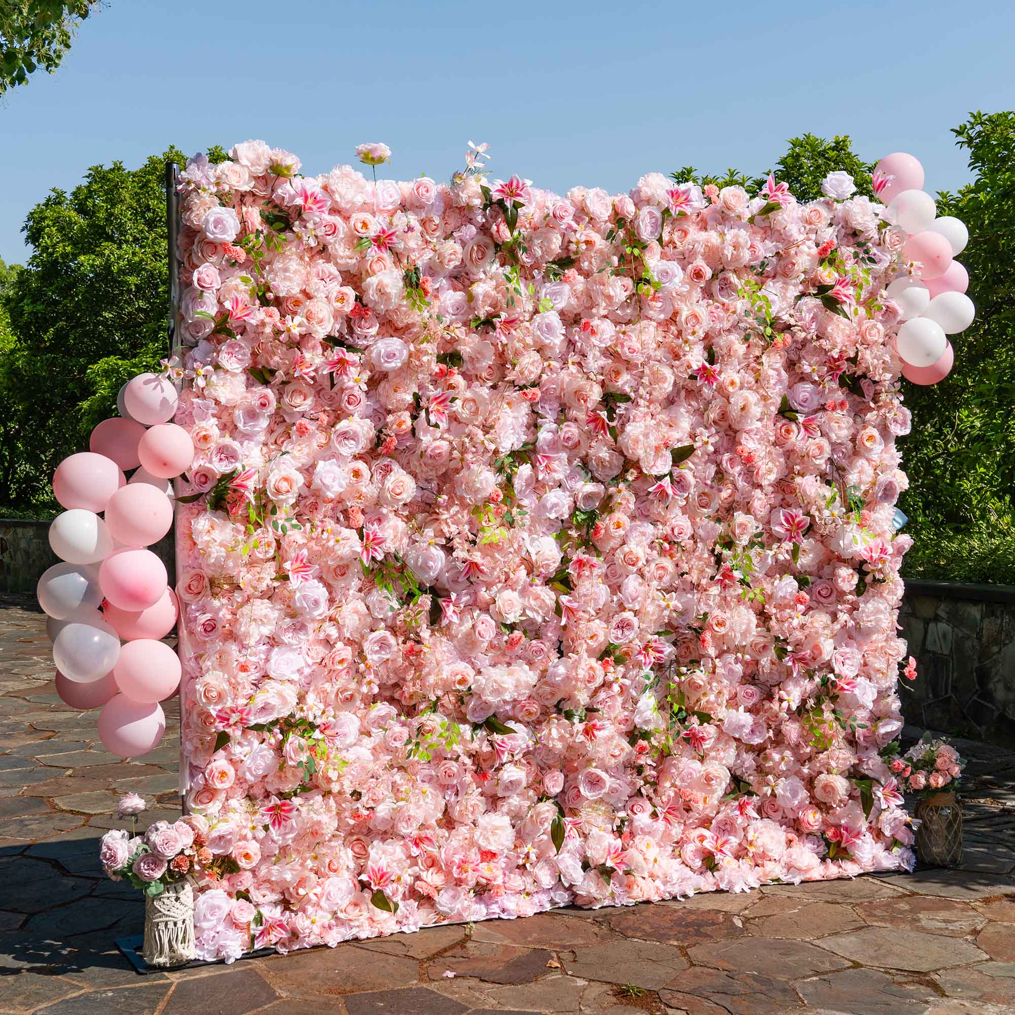 Fade-resistant and realistic, the rose pink flower wall side view features a fabric backing.