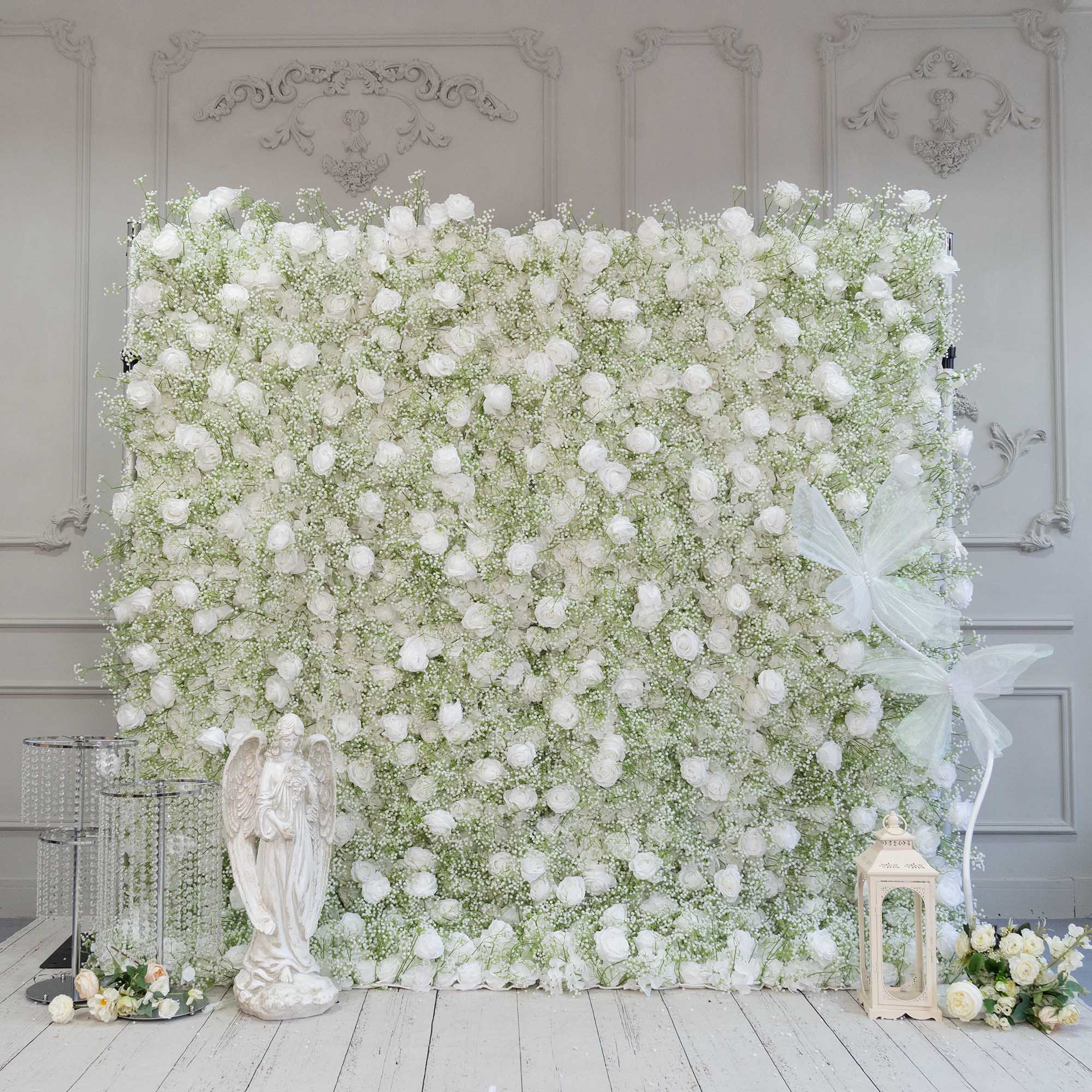 The baby's breath and white rose flower wall features a fabric backing, ensuring lifelike shapes and vibrant colors. 