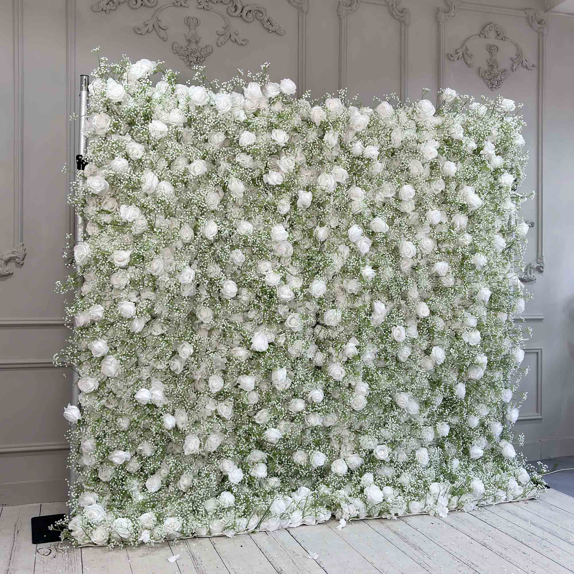 Fade-resistant and realistic, the baby's breath and white rose flower wall side view features a fabric backing.