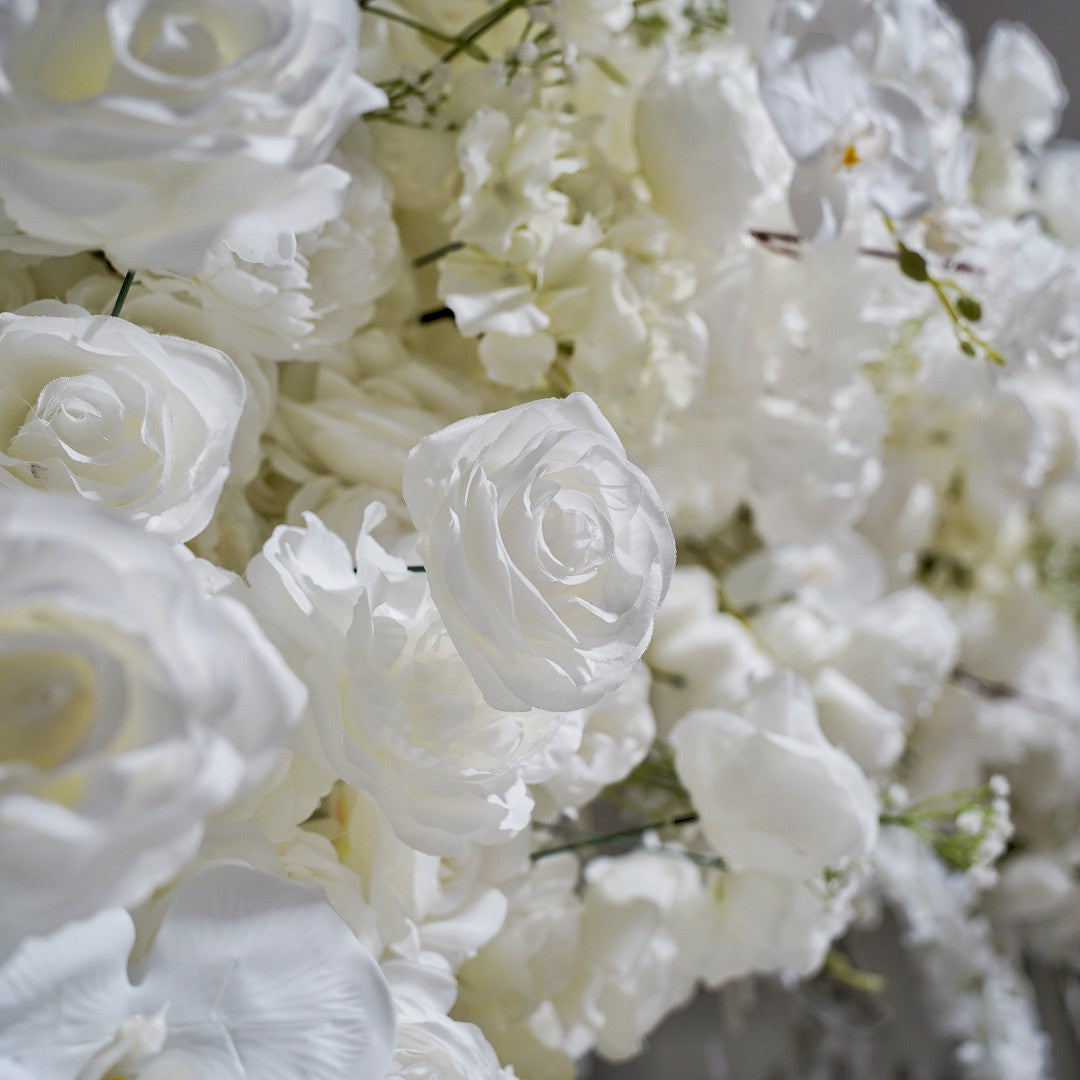 The white roses flower wall looks vivid and realistic.